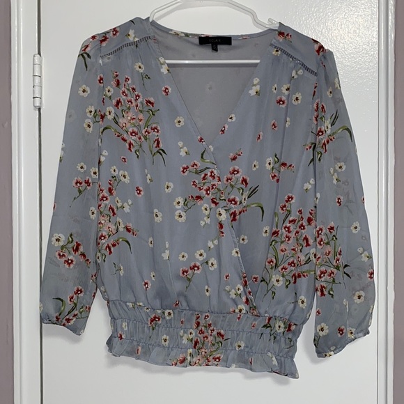 Size M light blue and‎ floral blouse - Picture 1 of 4